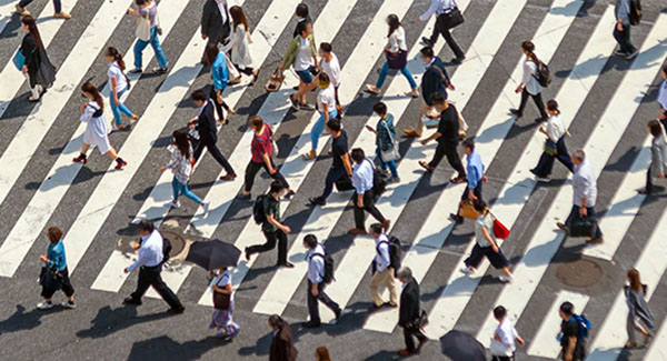 Groups of people crissing street