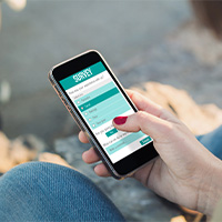 Woman filling online survey on her smartphone